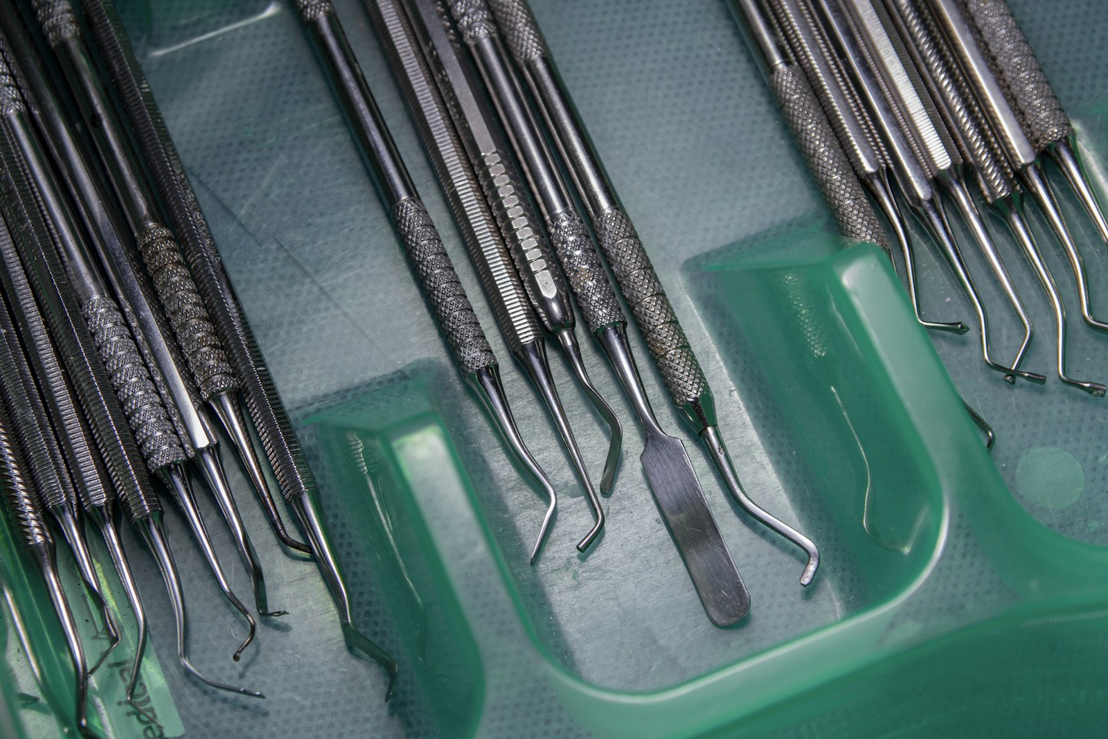 Precision dental instruments arranged on a clinical tray